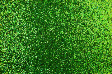 Shiny green plain glitter fabric empty background