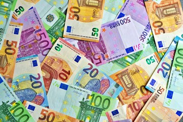 United country's payment system - euro money cash background, pile of paper euro banknotes.
