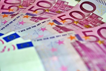 United country's payment system - euro money cash background, pile of paper euro banknotes.