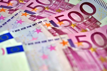 United country's payment system - euro money cash background, pile of paper euro banknotes.