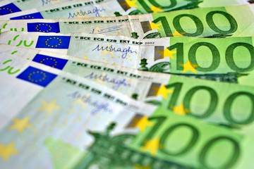 United country's payment system - euro money cash background, pile of paper euro banknotes.