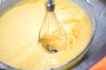 mixing homemade cake