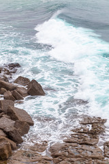 Ocean coast, moviment waves with foam.