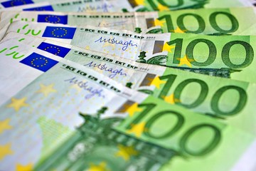 United country's payment system - euro money cash background, pile of paper euro banknotes.