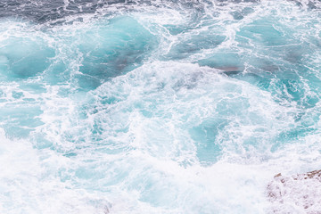 Ocean coast, moviment waves with foam.