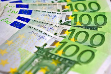 United country's payment system - euro money cash background, pile of paper euro banknotes.