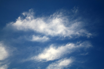 storm clouds on deep blue sky