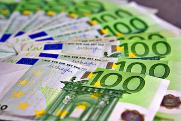 United country's payment system - euro money cash background, pile of paper euro banknotes.