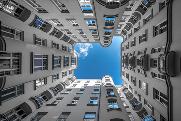 Directly Below Shot Of Buildings Against Sky