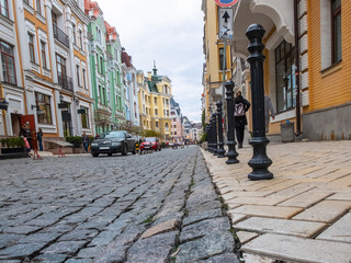 Beautiful Europe City street with colorful houses and a stone road