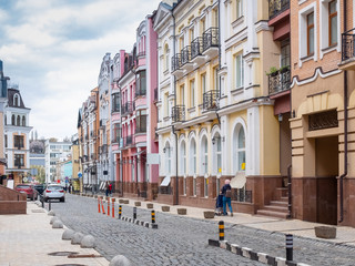 Beautiful Europe City street with colorful houses and a stone road