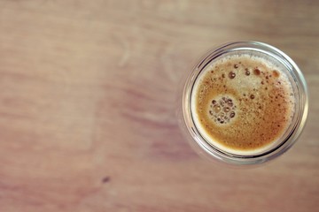 Coffee time in office. Capsule espresso in double glass cup - 100% arabica