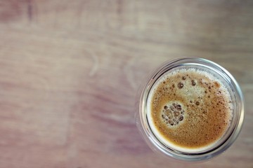 Coffee time in office. Capsule espresso in double glass cup - 100% arabica