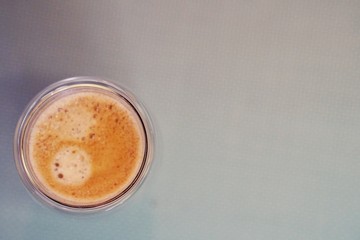 Coffee time in office. Capsule espresso in double glass cup - 100% arabica