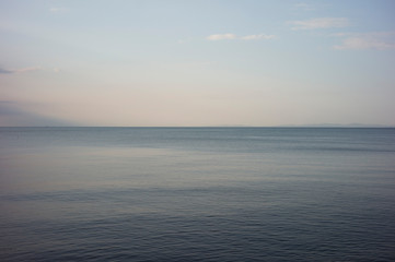 Sea and sky, stained glass tint, cloudy day.