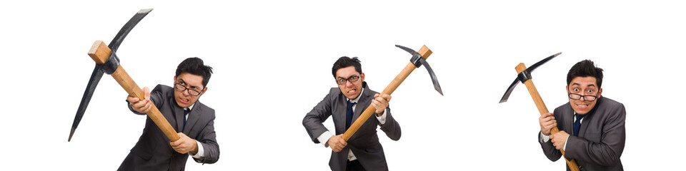 Young businessman holding a tool isolated on white