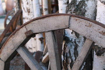 old wooden cart wheel