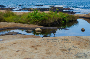 A peaceful pond among the rocks at Black Point Rhode Island