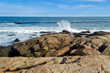Waves crashing on the rocky shore at Black Point Rhode Island