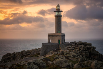 Punta Nariga lighthouse at sunset. Malpica de Bergantiños, Galicia, Spain.