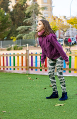 Little girl playing in park