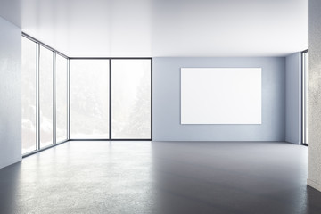 Minimalistic interior with blank billboard on wall.
