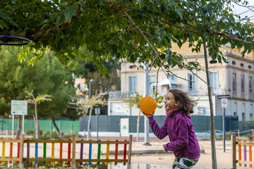 Little girl playing in park
