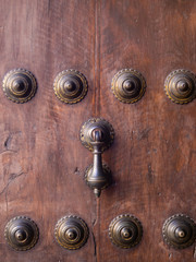 Old gates, doors, handles and locks in the old cities of Spain