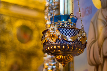 Gold lamp in ortodoxal church