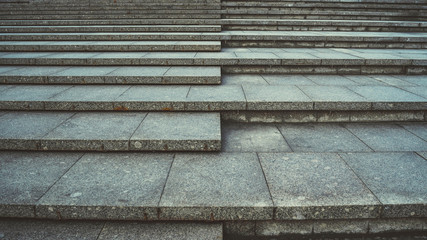 Texture of concrete steps. Stone staircase in centre of city. Outdoor stone steps background texture made of multitude slab.