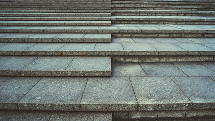 Texture of concrete steps. Stone staircase in centre of city. Outdoor stone steps background texture made of multitude slab.
