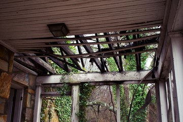 Inside Run down house with partially collapsed roof