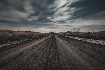 Long Exposure of Dark Rural Dirt Road in the Midwest United States | Moody - obrazy, fototapety, plakaty