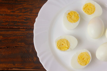boiled eggs on rustic wooden table. protein-rich food