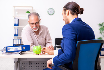 Financial advisor giving retirement advice to old man
