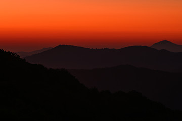 Orange Morning Sky Over Ridges