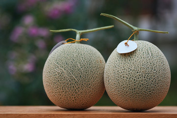 The cantaloupe melon on a wicker basket