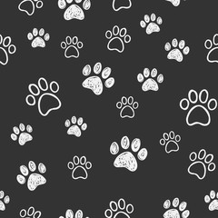 Fototapeta premium Dog paw doodles seamless pattern. Doggie love background. Puppy cute footprints.