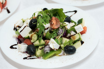 fresh salad with feta cheese and black olives