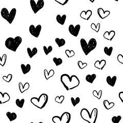 Heart doodles seamless pattern. Valentine's day texture design. Love background with hand drawn illustrated hearts.