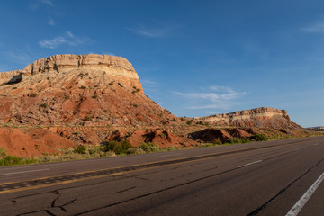 Landscape of road and colorful stone formations somewhere in New Mexico