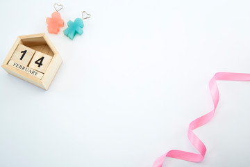 14 of February on wooden calendar on white