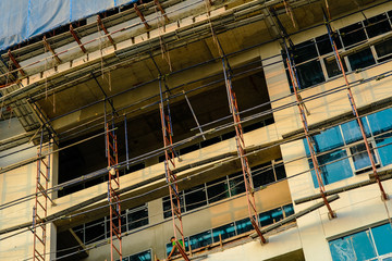 Construction site of glass window modern office building
