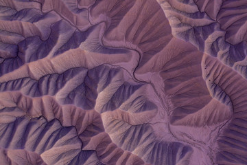 aerial view of colorful desert abstract organic texture badlands