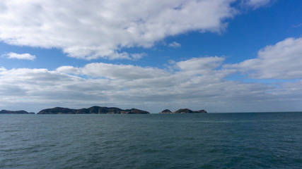 Naklejka premium beautiful sea view and clouds take on ship