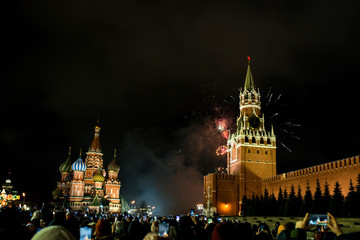 salute in honor of the new year 2020 on red square against the Kremlin, Spasskaya tower and St. Basil's Cathedral