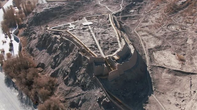 Aerial view of China Xinjiang Taxkorgan(Tashkurgan) Stone City. The Stone City Kashgar. Drone Shot Footage 4K (UHD).
