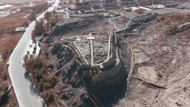 Aerial view of China Xinjiang Taxkorgan(Tashkurgan) Stone City. The Stone City Kashgar. Drone Shot Footage 4K (UHD).