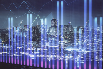 Financial graph on night city scape with tall buildings background double exposure. Analysis concept.