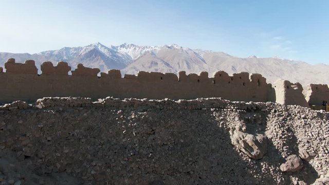 Aerial view of China Xinjiang Taxkorgan(Tashkurgan) Stone City. The Stone City Kashgar. Drone Shot Footage 4K (UHD).